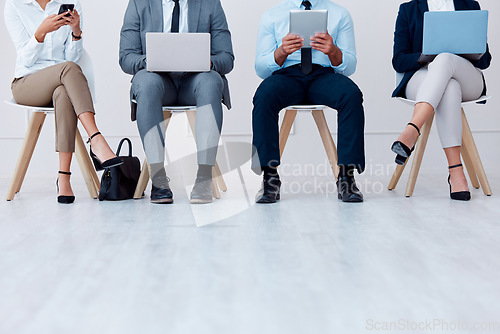 Image of We are hiring, interview and technology of business workers waiting for management meeting. Potential corporate team wait for hire, welcome and recruiter question process in a company tech office