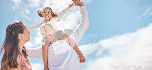 Image of Family, children and love with foster parents and adopted girl outside during day with a blue sky in the background. Mother, father and daughter spending time together and bonding with love and care