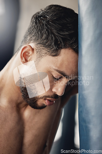 Image of Tired, challenge and sad boxing man break, quit and training fatigue. Frustrated loser, stress fail and depression mma fighter breathing in gym club, wrestling athlete weakness and boxer combat sport