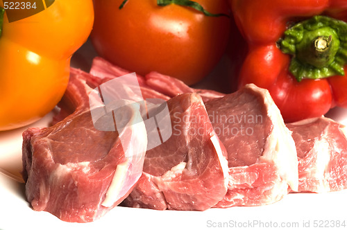 Image of rib lamb chops with vegetables tomato