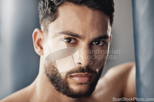Image of Portrait of muscular man in gym after fitness, exercise or workout and looking serious. Strong athlete cardio exercise, muscle power from sports and professional fight competition looking focused