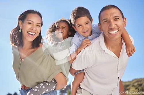 Image of Happy family portrait, parents piggyback children and smile together at outdoor park in blue sky with father. Young mother with cute kids, fun sunshine happiness and beautiful summer brazil holiday