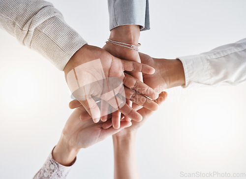 Image of Teamwork hands, partnership and collaboration support for winner, motivation and vision of goals. Below business group people connect in trust, success commitment and working for solidarity together