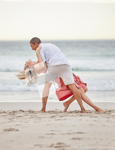 Image of Dancing, happy couple and beach celebrate of love, trust and engagement on romantic luxury holiday travel Bali vacation. Man and woman or dancer couple celebration on sea water, sand and sunset ocean