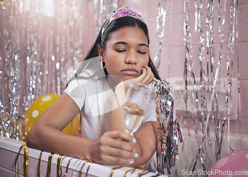 Image of Birthday girl, sad and champagne while feeling bored, upset and disappointed while sitting alone in bathtub lonely and depressed. Unhappy, boring and abandoned woman during quarantine celebration