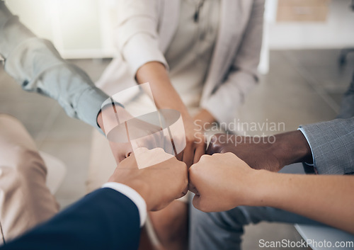 Image of Teamwork, diversity hands and trust with business people with fist together for collaboration, support and motivation. Closeup of multiethnic group, team and colleagues working for growth and success