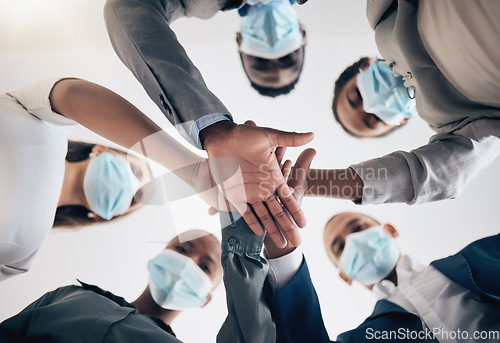 Image of Covid, team and hands in for support and teamwork motivation of office workers together. Circle of business worker group in a circle as a hand sign of work solidarity, job community and collaboration