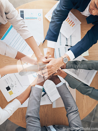 Image of Team hands, support and work motivation of business workers working with financial data. Finance collaboration, teamwork and accounting employee group together planning a project with tax documents