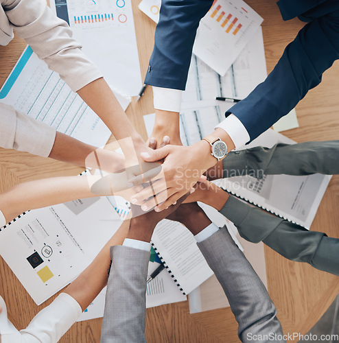 Image of Office hands work on paperwork together, showing corporate cooperation and healthy community culture to reach business goals. Success is collaboration through teamwork, innovation and positivity