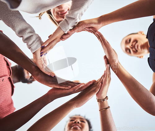 Image of Diversity, teamwork and hands in circle synergy of employee workers together in collaboration and solidarity. Diverse group of people hand in unity for agreement, help and team for community support