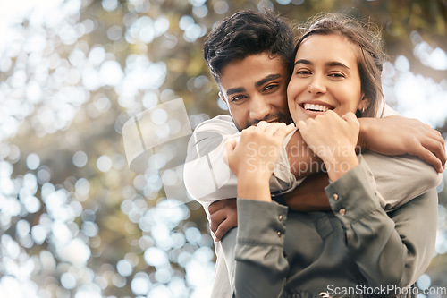 Image of Couple hug, nature date and smile for love in summer, happy in park and affection with green trees in background with bokeh in garden. Face portrait of man and woman hugging in city spring