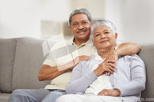 Image of Portrait of senior couple relax with love on a home living room sofa happy, smile and enjoy peace, freedom and calm lifestyle. Romantic, elderly man and woman living retirement life together bonding