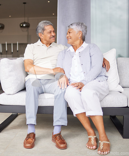 Image of Retirement, love and marriage with senior couple sitting on sofa together for care, support and wellness. Elderly, trust and embrace with old age married man and woman in family home