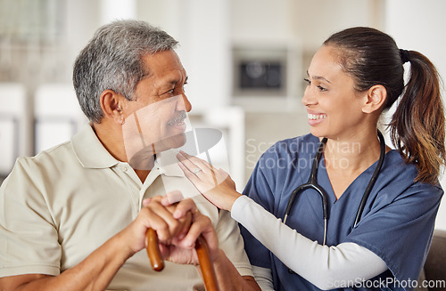 Image of Nurse or caregiver with elderly man patient helping support, trust and care on sofa at retirement nursing home. Happy consulting healthcare doctor give helping hand to Alzheimer medical senior male