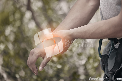 Image of Nature, fitness and man with wrist pain or injury from physical action with red light. Fitness man check for injured muscle and joint inflammation outdoor during activity, workout or training