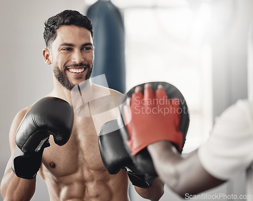 Image of Fitness boxing, happy man training workout and cardio exercise motivation goals. Healthy muay thai athlete, strong ab muscle power and young sports mma boxer smile in gym with boxing gloves