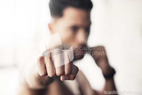 Image of Boxer fist, fitness training and gym exercise for wellness, exercise for sports health and motivation for fight competition with power. Athlete boxing for cardio with background bokeh at club