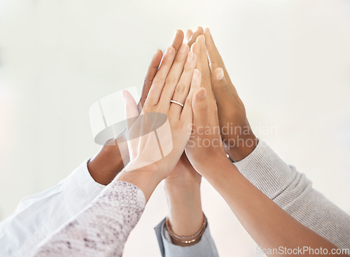 Image of Hands, teamwork high five and collaboration success after winning partnership in startup meeting. Winner team, trust and working in support on mission, vision or target goal motivation for business.