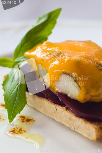 Image of Smoked Haddock On A Bed Of Beet-root With Melted Blue Cheese