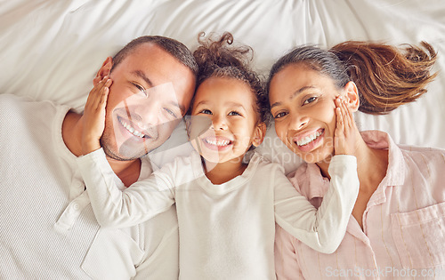 Image of Happy, family and bed of people smile with above view in a bedroom with happiness at home. Portrait of a mother, girl and man from Spain spending quality time together with love and care at a house