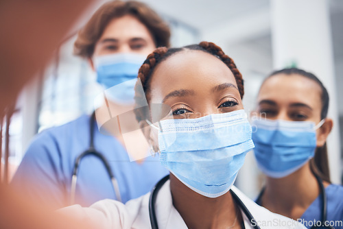 Image of Covid, selfie and medical healthcare team happy about teamwork in a hospital or clinic. Portrait of a black woman doctor with nurse group together ready to start on employee collaboration or surgery