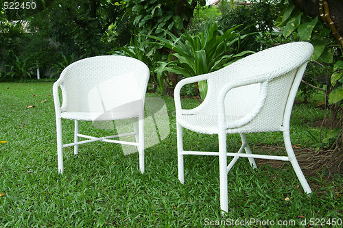 Image of Two white chairs