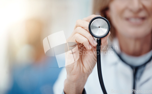 Image of Hand of professional doctor with stethoscope for medical healthcare lab test results in cardiology and medicine. Hospital innovation, research and consulting in pharmacy help with heart rate problem