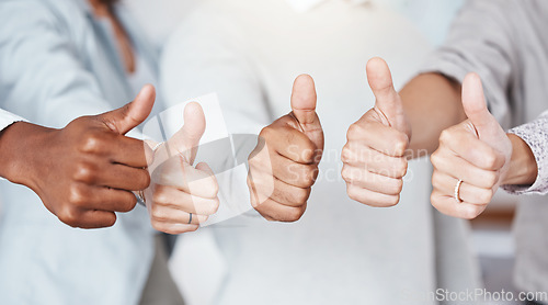 Image of Thumbs up, diversity and a yes sign by business people in a startup company or successful marketing agency. Hands, collaboration and team of workers that approve of a global partnership and support