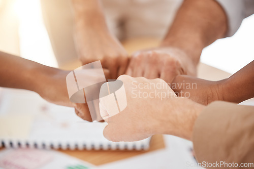 Image of Fist bump, collaboration and team building after a business meeting on planning, diversity and our vision as a company. Global, mindset and solidarity as a group with motivation, hands and goals