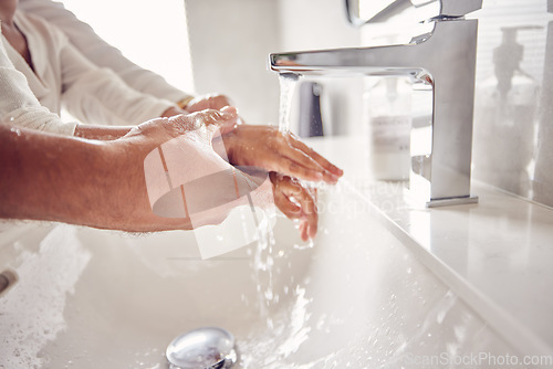 Image of Father, girl or washing hands help in water for covid bacteria cleaning or morning hygiene wellness. Zoom, man or child in home or house bathroom sink in safety skincare for healthcare security virus