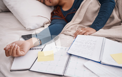 Image of Calendar, time management and student sleeping in bed for studying education, learning knowledge and planning. Tired, burnout college university woman with notebook, sticky note planner and schedule