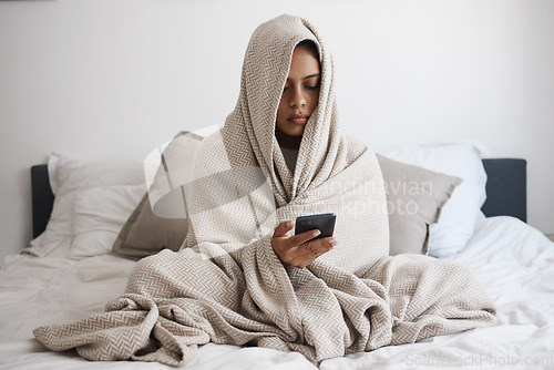 Image of Depression, anxiety and woman texting in bed, reading online social media bullying post, feeling alone in bedroom. Mental health, fear and sad female looking unhappy, vulnerable in emotional crisis