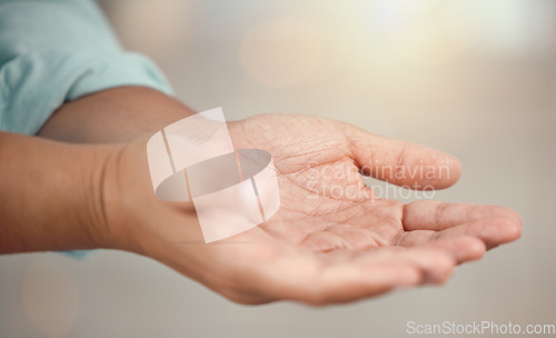 Image of Person open hands for charity, support or poverty with lens flare and mockup. Community, love and care with empty palms in prayer, hope or faith icon or sign for advertising or marketing with mock up