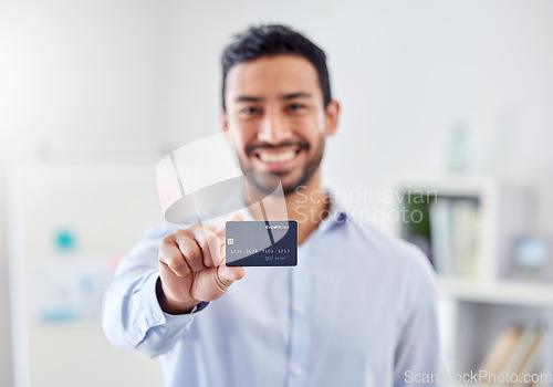 Image of Hand, smile and businessman with credit card for finance, bank and money payment in a work office. Portrait of happy corporate employee able to buy or pay bills, retail shopping or debt with salary