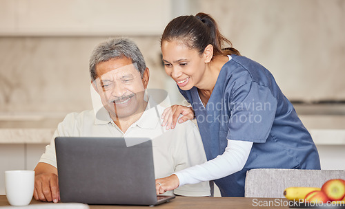 Image of Happy nurse help senior man with laptop, showing how to make a video call or search the internet in an assisted living home. Senior patient enjoying time with healthcare worker, reading online news