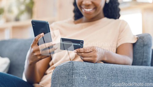 Image of Black woman, online shopping and ecommerce phone payment on credit card, mobile money and internet finance on home sofa. Closeup of happy african person, cellphone banking and easy fintech technology