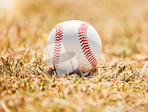 Image of Baseball, sports and sport field on grass in nature on a outdoor training court. White ball on the ground for exercise, cardio training and fitness workout of player and athlete team game in autumn