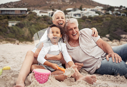 Image of Family, time and beach with grandparents and grandchild laugh and play in sand, sitting and bonding in nature. Portrait of a happy girl enjoying seaside trip with senior man and woman, relax and fun