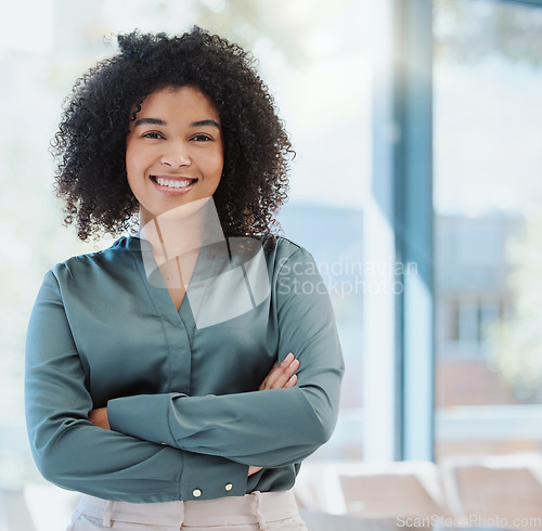 Image of Happy human resources manager smile, leadership and vision for success. Portrait of a black business woman standing arms crossed, smiling and feeling positive while working in an startup office