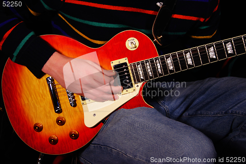 Image of Strumming Electric Guitar