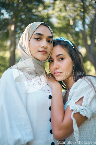 Image of Friends portrait, muslim and woman in park for love, care and women support with hijab or fashion. Islam, Arab, Turkey or Istanbul young people or girl for modest design with garden or nature bokeh