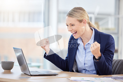 Image of Success, celebration and business woman on a laptop at her desk in corporate modern office. Happy, celebrate and victory of professional manager with smile and pumping her fist in happiness and pride