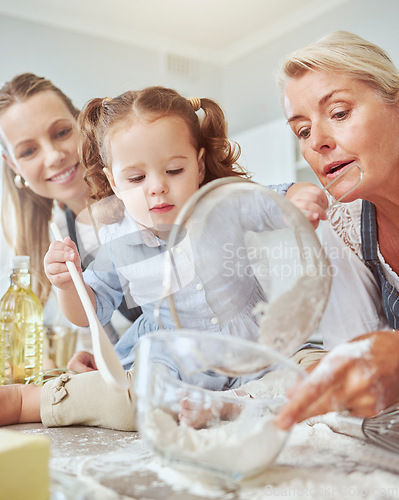 Image of Mother, grandma and girl baking in family home, to make snack, biscuit or pie while have fun. Happy mom with proud grandmother in kitchen together teaching girl to bake cake or cookies for family