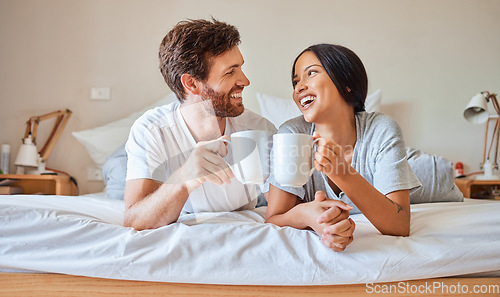 Image of Happy morning, coffee and couple smile in bed feeling relax, love and happiness in a bedroom home. Smiling boyfriend and girlfriend together in a house laughing and spending quality time drinking tea