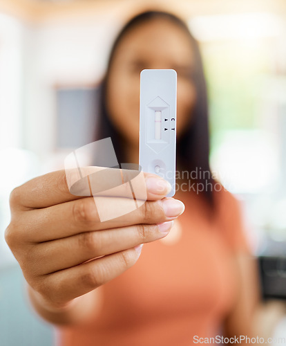 Image of Woman hands, covid and negative rapid antigen test results for healthcare, medical risk and safety. Closeup of corona virus home testing kit, pcr cassette and medicine diagnostics check for wellness