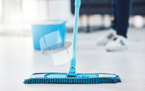 Image of Woman, floor mop and cleaning housekeeping product for home cleaner in hygiene bacteria maintenance. Employee service zoom, maid and worker in healthcare spring clean of office building interior room