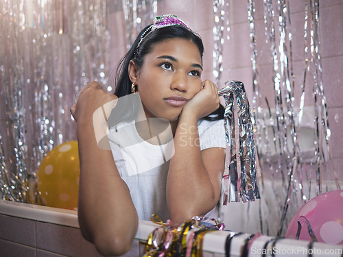 Image of Girl in bath thinking during party with bored, tired or frustrated expression on face. Woman in bathroom, with crown and glitter from birthday celebration, feel sad, annoyed or disappointed in house