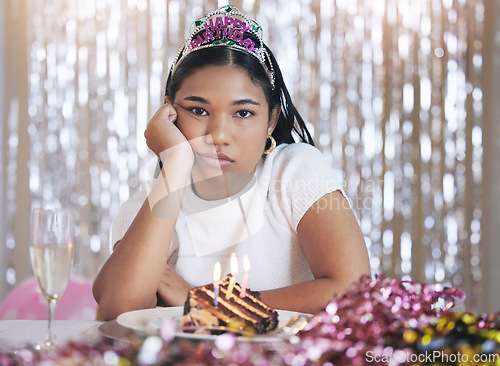 Image of Bored, angry and birthday girl at a party at a celebration event with cake and candles upset. Portrait of a person from Mexico with sweet food feeling frustrated, sad and unhappy celebrating