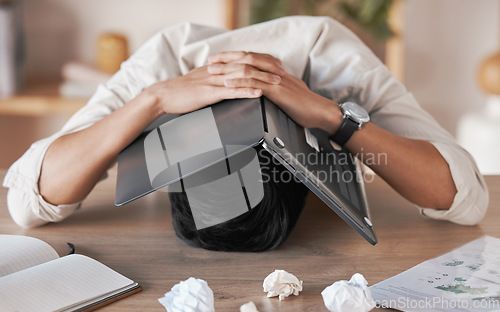 Image of Stress, frustrated and burnout for man with laptop to cover face, head or skull overwhelmed with paperwork. Marketing business man with crumble paper and frustration from work load, chaos or problem