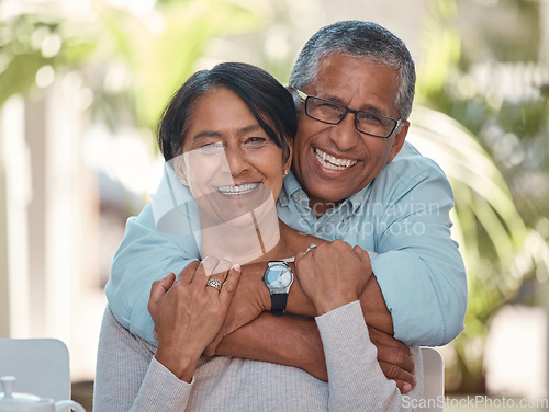 Image of Portrait, elderly and couple bonding on a patio at home, hug, laugh and relax outdoors together. Love, retirement and happy seniors enjoying their relationship and bond, free time and fresh air